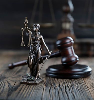 An image capturing a Huntington Beach employment law with statue of law of lady. | United Employees Law Group