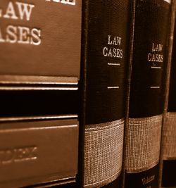 A stack of legal documents relevant to employment law cases in Pasadena. | United Employees Law Group