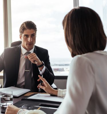 A client having a legal consultation with a Santa Ana employment attorney.